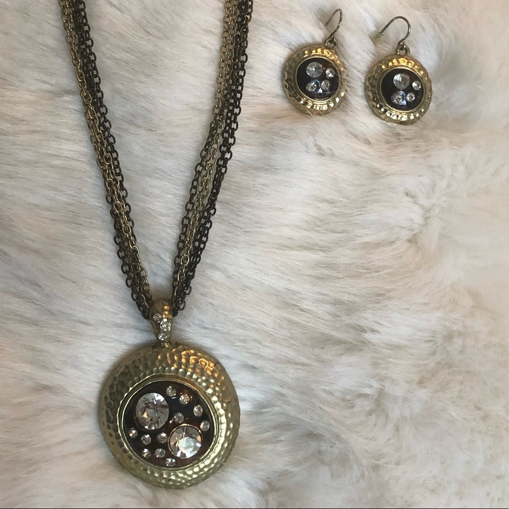 Gold costume necklace with matching earrings